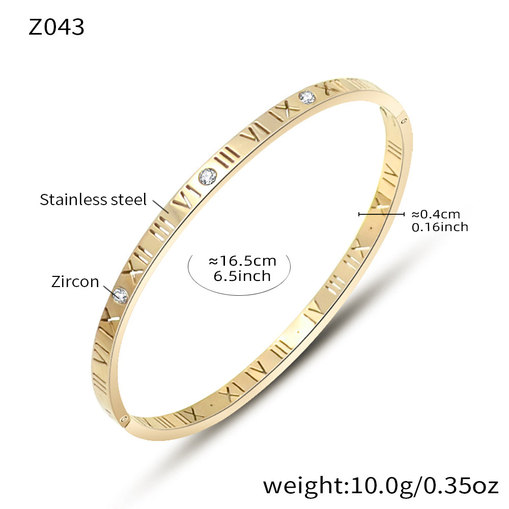  Flat lay of gold stainless steel bracelet with size and material chart