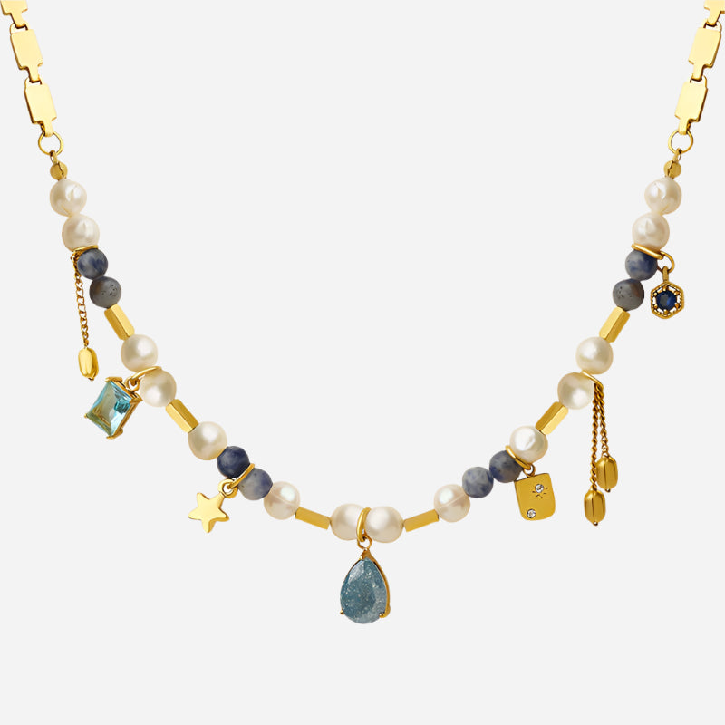 Gold delicate choker necklace with freshwater pearls on white background