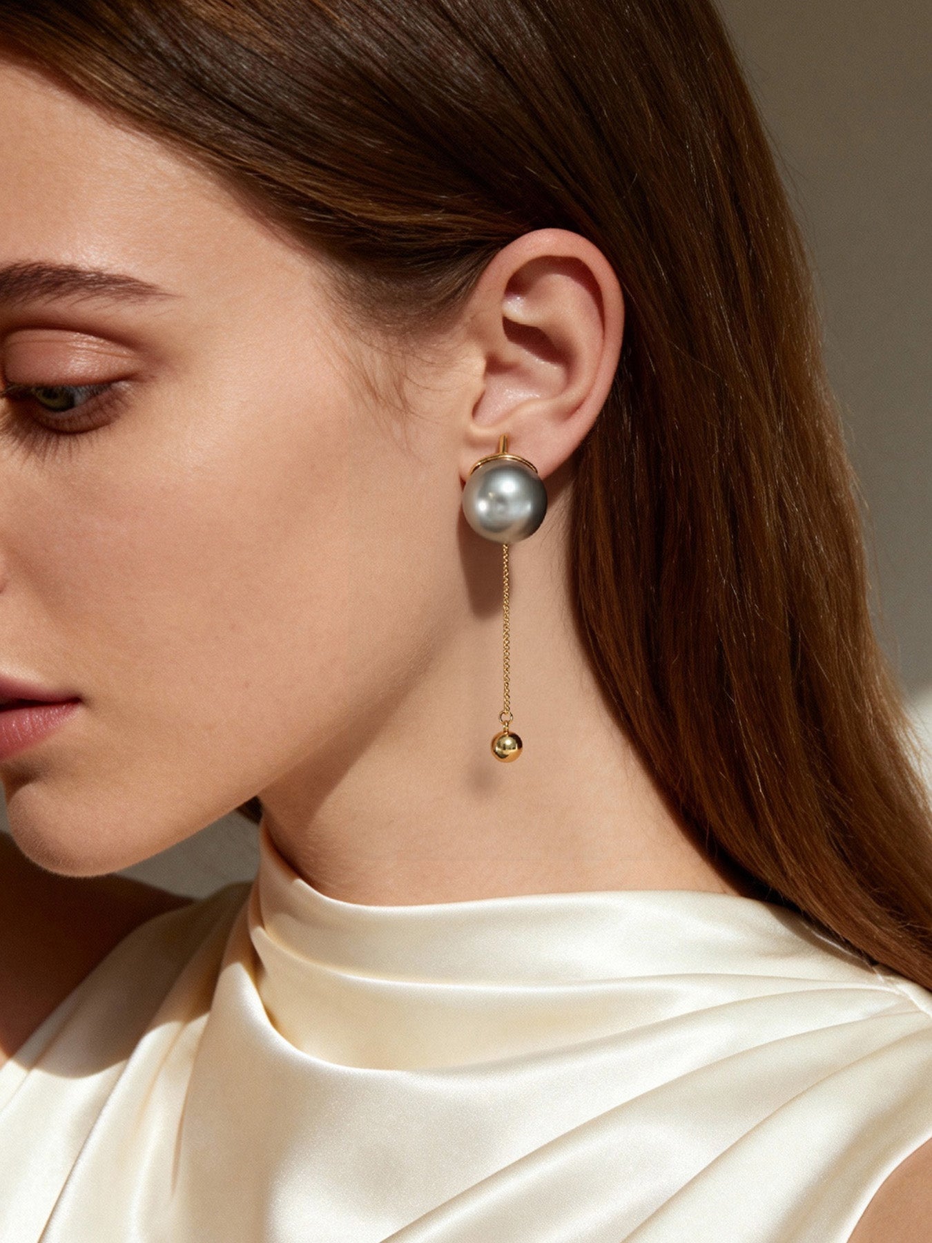 Pendientes de flecos de diseñador con detalles de perlas