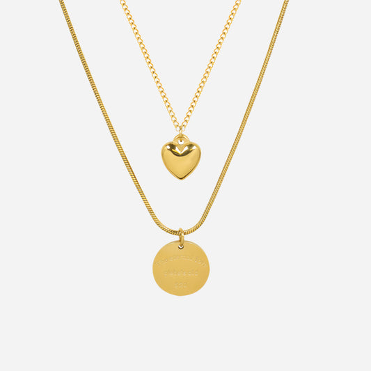  Gold double layered peach heart charm necklace displayed on white background – romantic and waterproof stainless steel jewelry