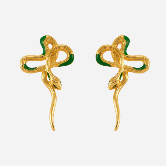 Gold snake-shaped earrings with green accents on a white background