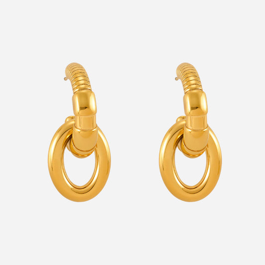 Pair of gold hoop earrings on a white background