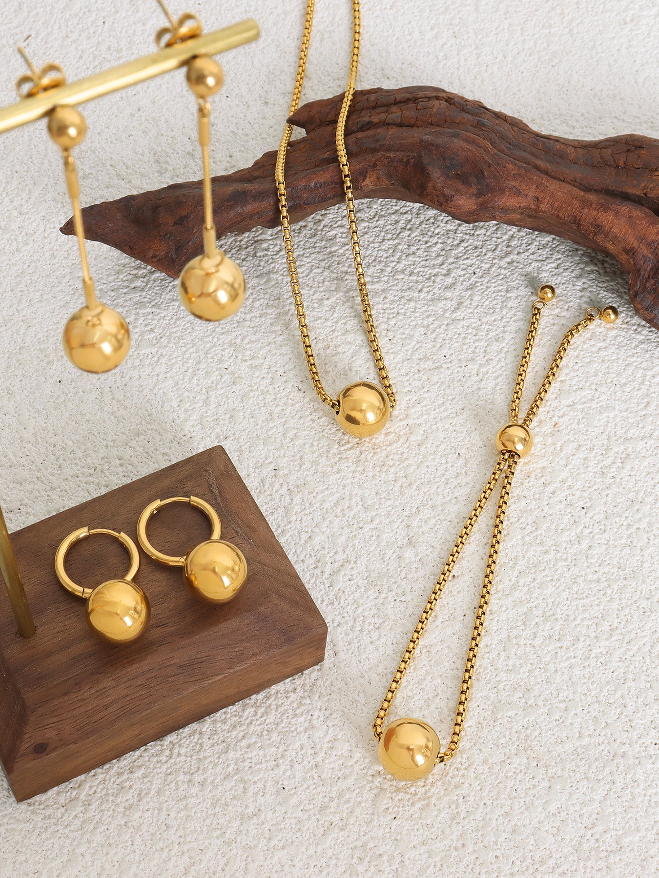 Gold Plated Earrings With Ball Pendant