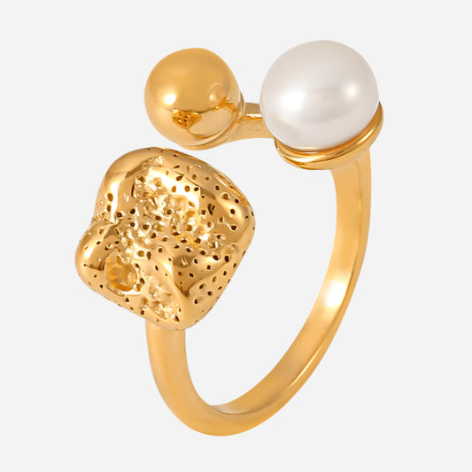 Gold-plated stainless steel freshwater pearl ring with textured heart detail on light gray background