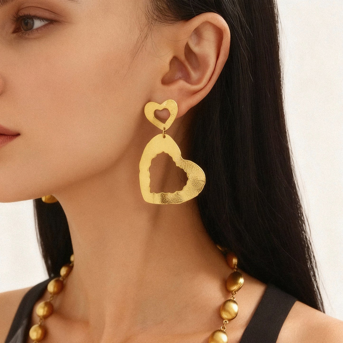 Pendientes de doble corazón de acero inoxidable dorado