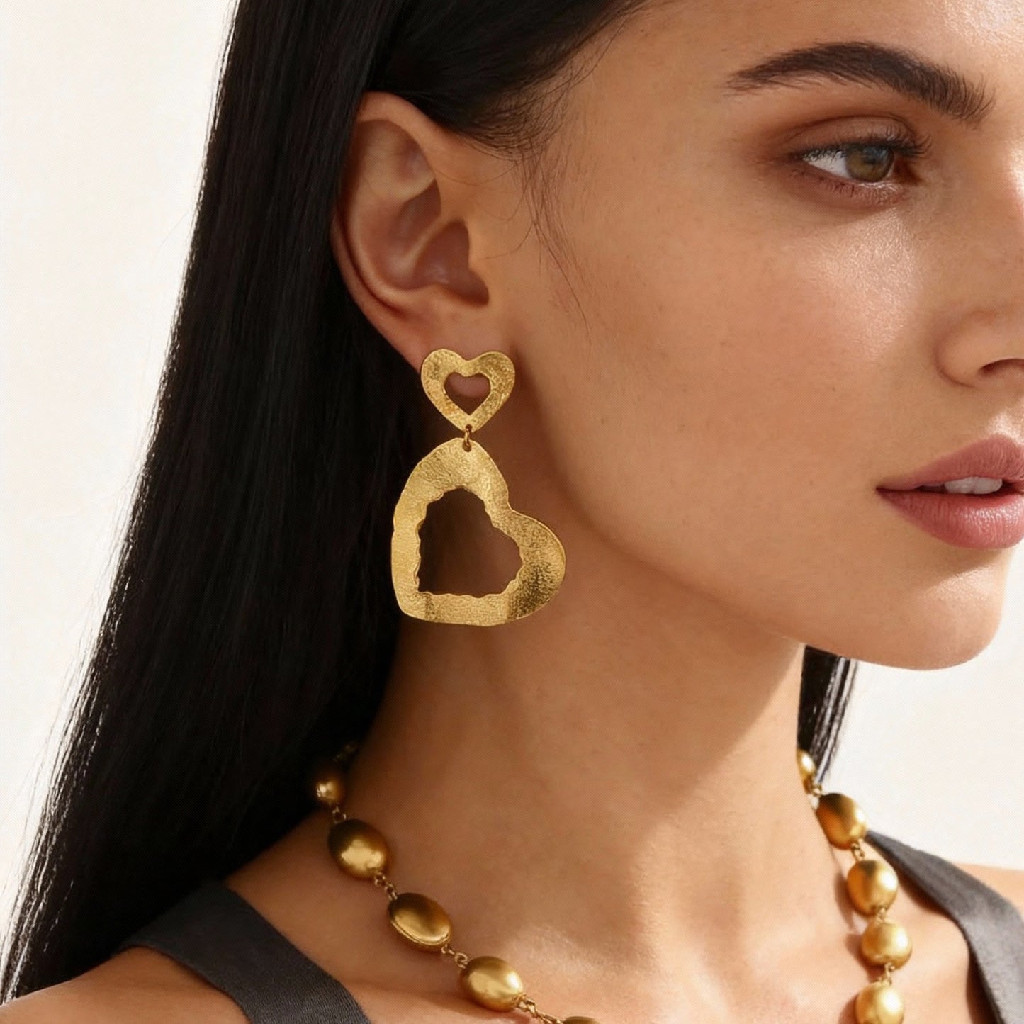 Pendientes de doble corazón de acero inoxidable dorado