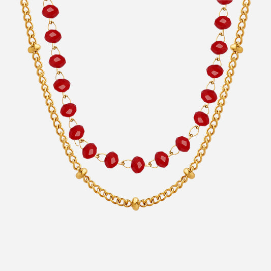 Double-layer red sea glass necklace with gold stainless steel chain on white background