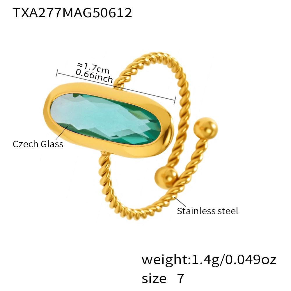 Waterproof gold sea glass bracelet with green Czech glass charm and measurement labels