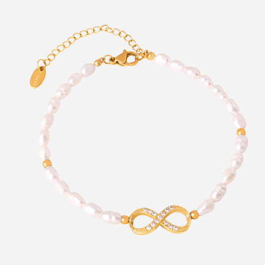 White background image of infinity gold pearl bracelet with waterproof design