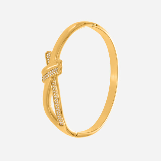 Elegant 18K gold knotted CZ cuff bangle displayed on a clean white background, showing the smooth curves, micro-pavé zircon detailing and Endures-Forever’s waterproof stainless steel shine.
