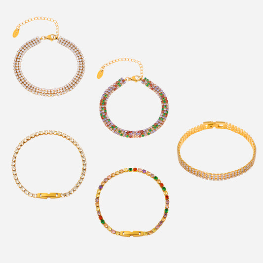Multicolor beaded gold bracelets set on a white background – vibrant stainless steel tennis design