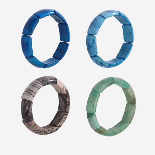 Colorful stretch tennis bracelets with natural gemstone beads and stainless steel accents – white background