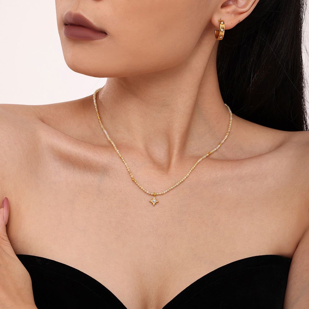 Natural Stone Cross Necklace styled by model – Side Profile