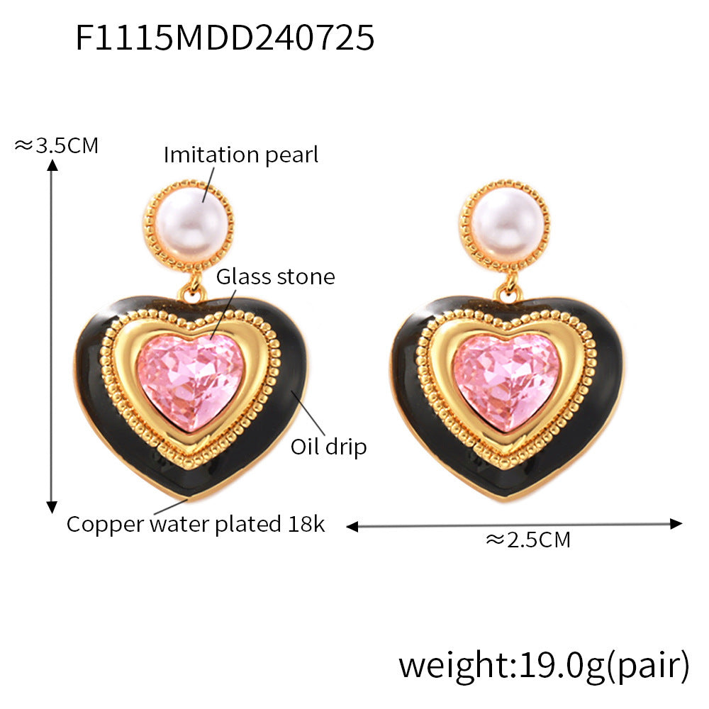 Size diagram of pink heart crystal stud earrings with pearl top and gold border, including measurements