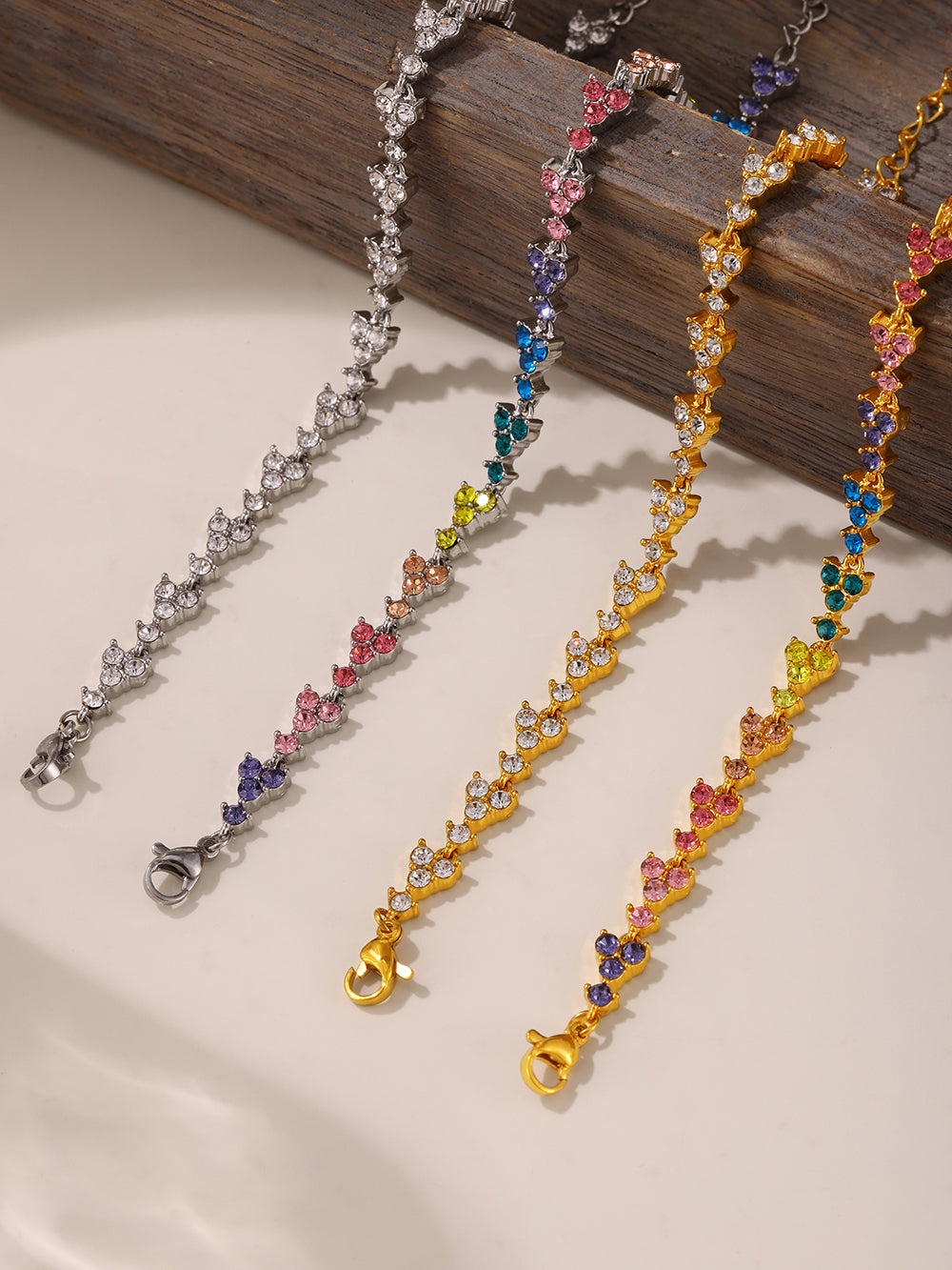 Prism Verse multicolor tennis bracelet worn by woman outdoors in casual summer outfit