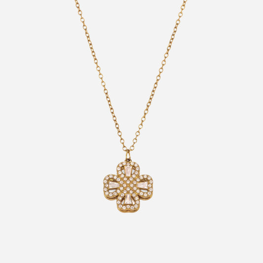 Gold rotating flower necklace with cubic zirconia on white background