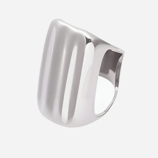 Silver ring with a modern design on a white background