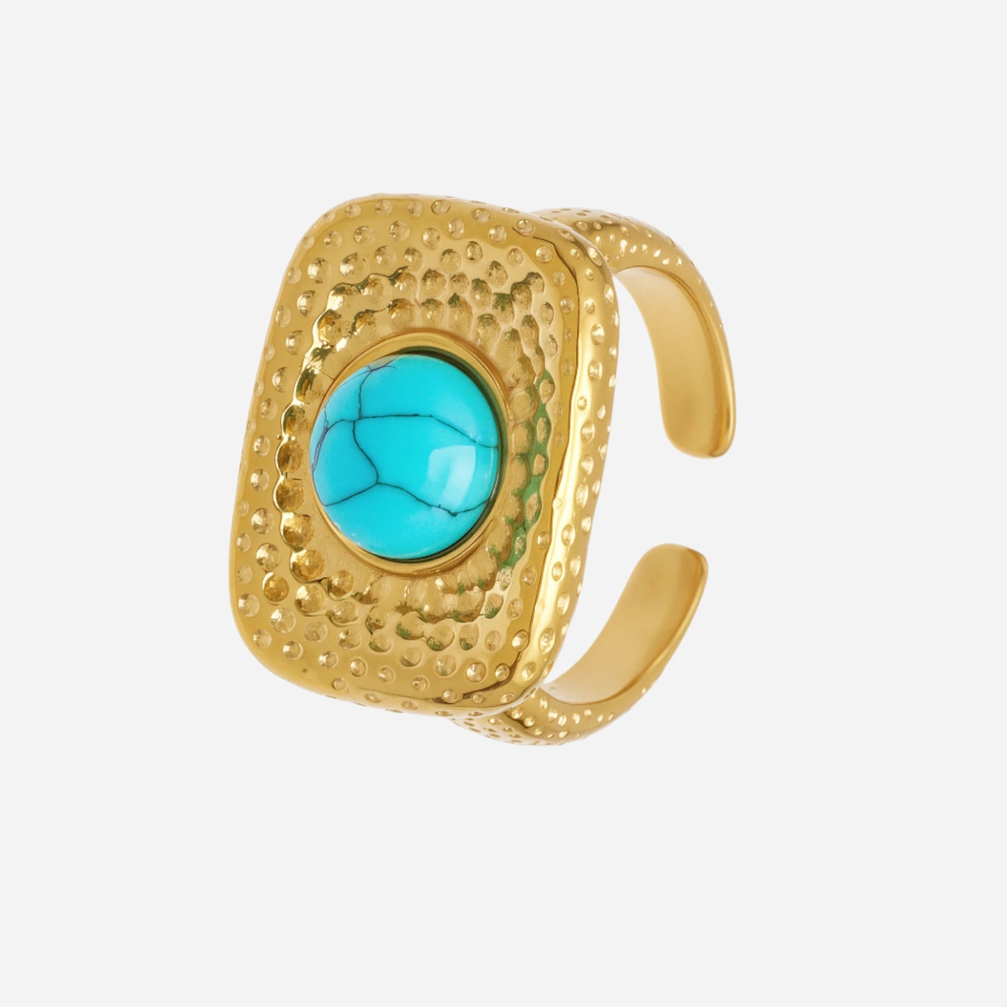 Gold ring with a turquoise stone on a white background