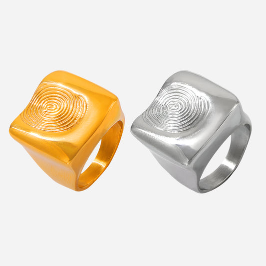 Adjustable gold and silver rings with textured design on white background – statement jewelry set