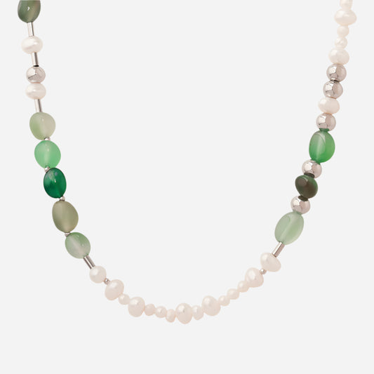 Freshwater pearl necklace with natural stone beads on white background