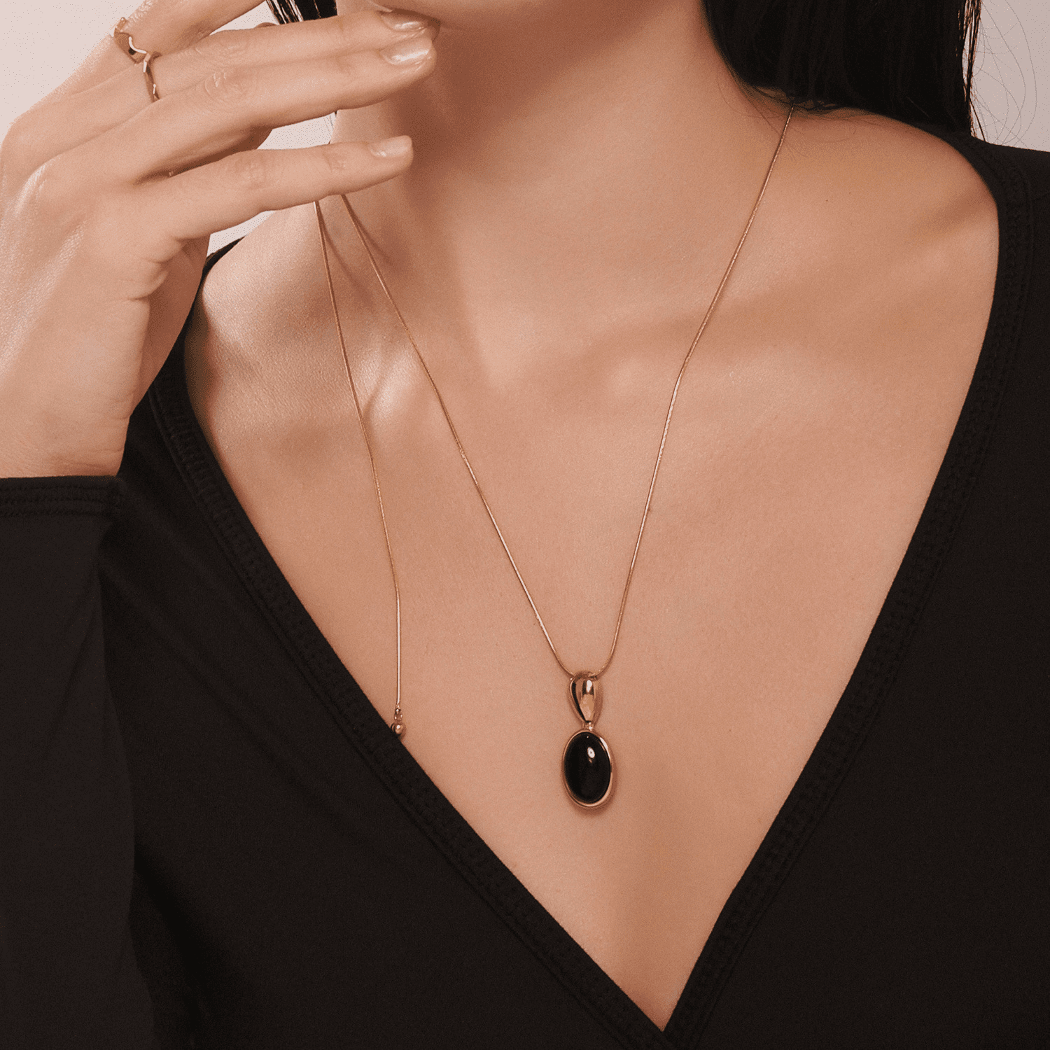 Model wearing gold tiger eye long necklace – 100cm stainless steel