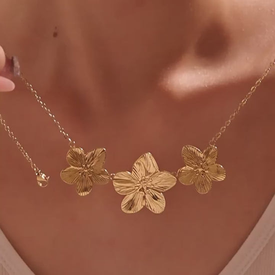 Model video showcase of Flora Tennis Necklace – stainless steel floral charm
