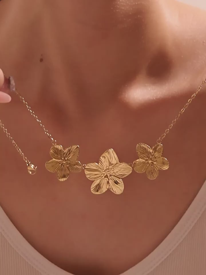 Model video showcase of Flora Tennis Necklace – stainless steel floral charm
