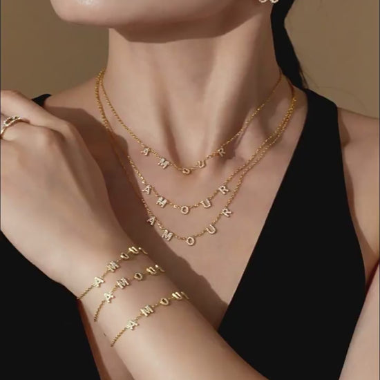 Detailed close-up of the TXP304 AMOUR Necklace, focusing on the dazzling 5A grade cubic zirconia stones and fine stainless steel chain at 40+5cm length.