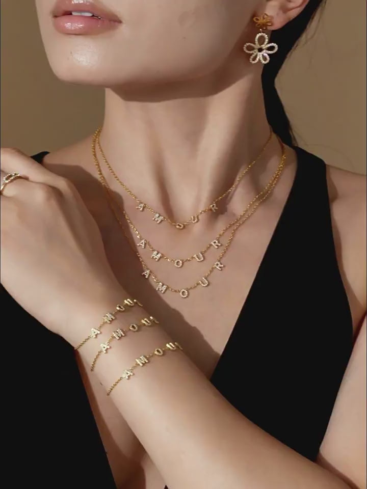 Detailed close-up of the TXP304 AMOUR Necklace, focusing on the dazzling 5A grade cubic zirconia stones and fine stainless steel chain at 40+5cm length.