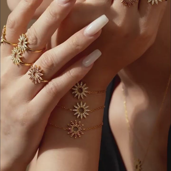360° view of waterproof gold sunflower charm necklaces with white and pink zirconia stones – perfect for summer styling and layering.