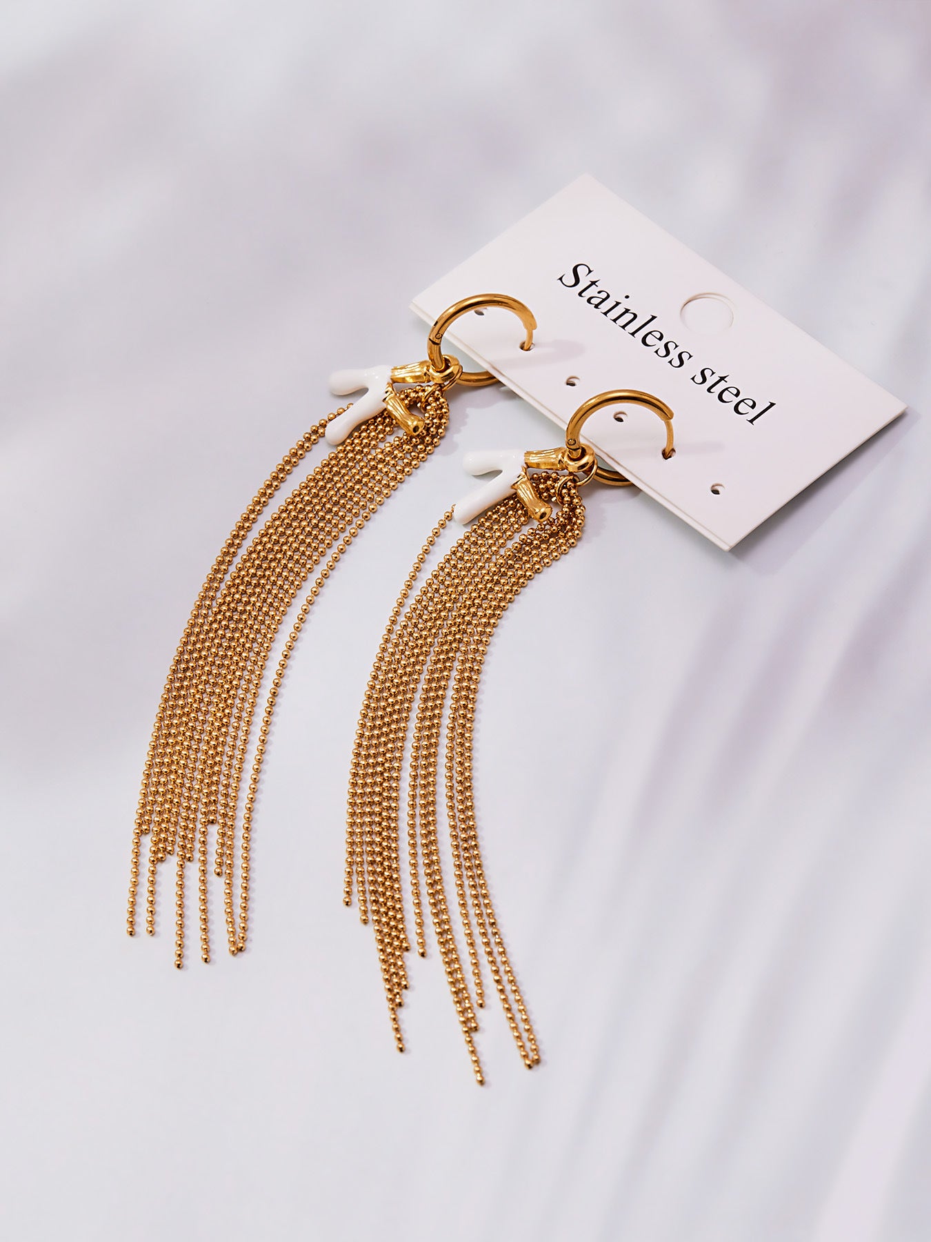 Pendientes de alta gama con borlas y nombre de la letra K